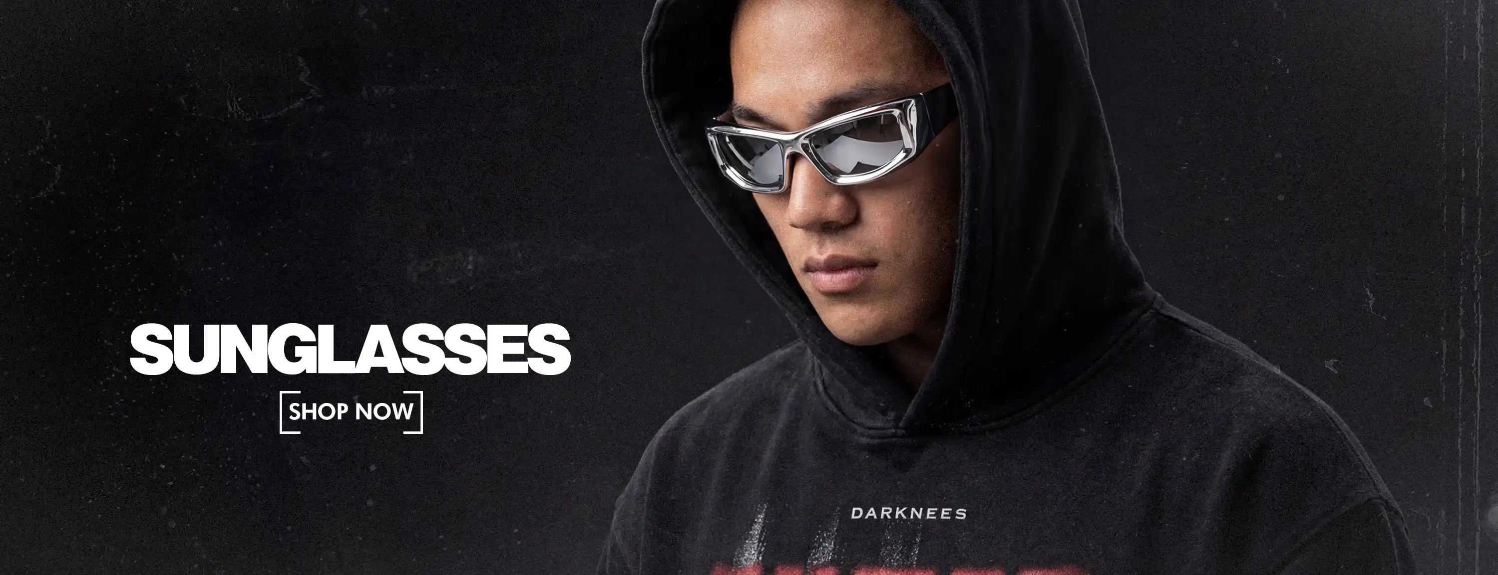 man wearing y2k sunglasses