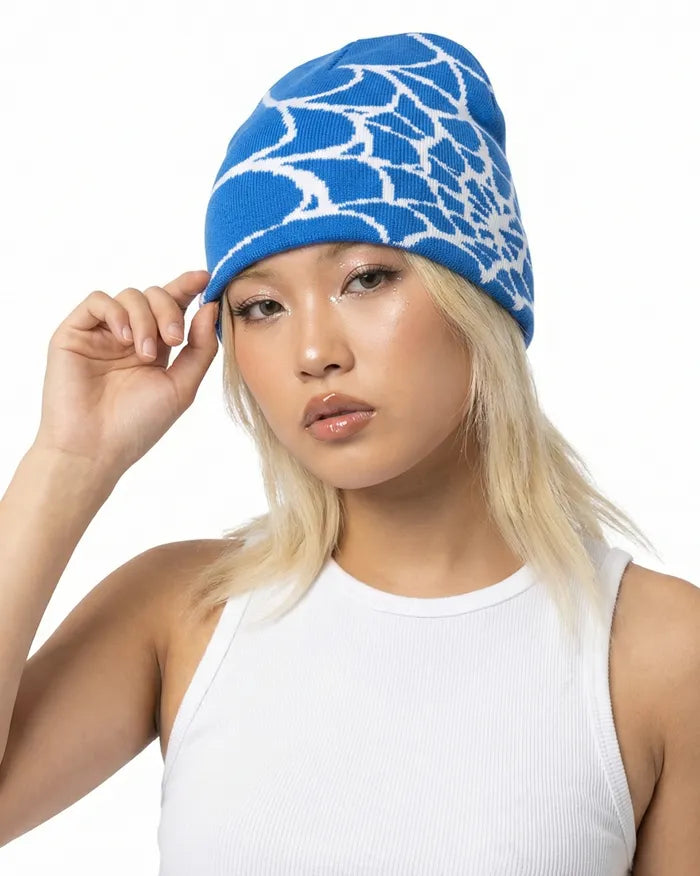 woman with the Spider Web Beanie "Pyro" in blue color