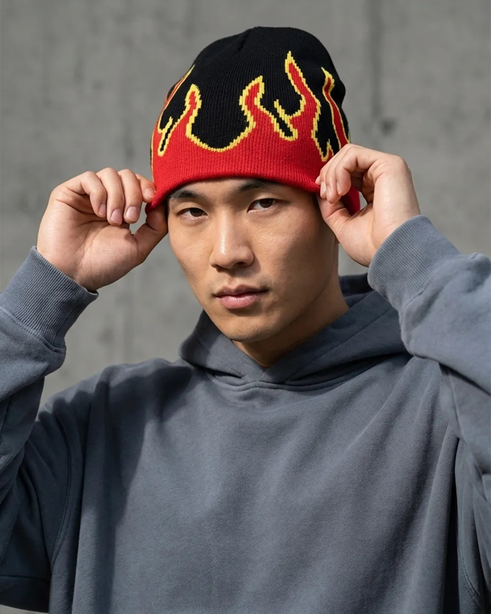 asian man with Y2K Flame Beanie