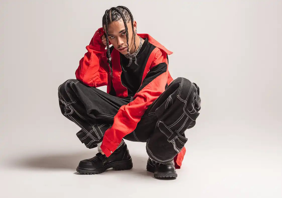 Black man in y2k fashion outfit