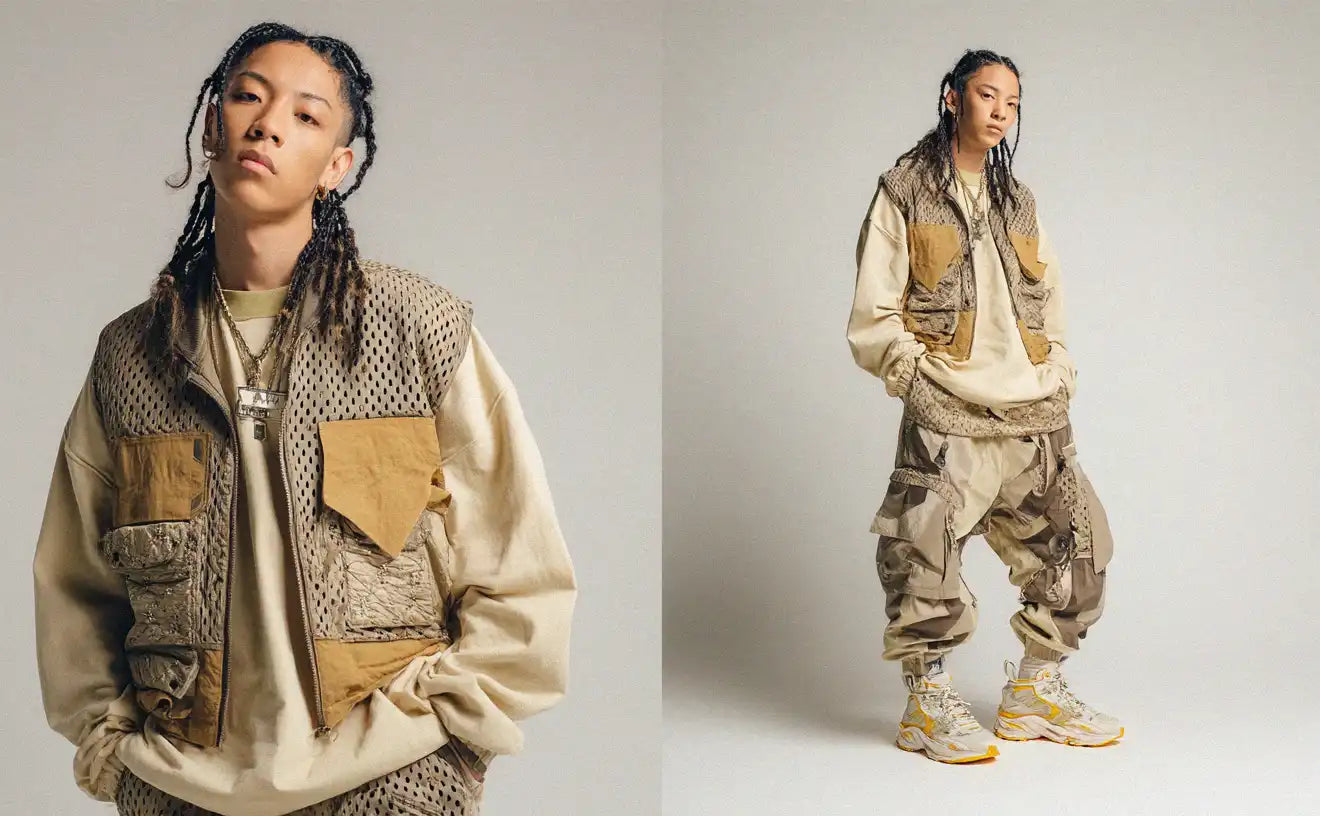 Male model in tactical beige Y2K fashion, including mesh and patchwork textures, layered for a utilitarian twist on early 2000s urban clothes.
