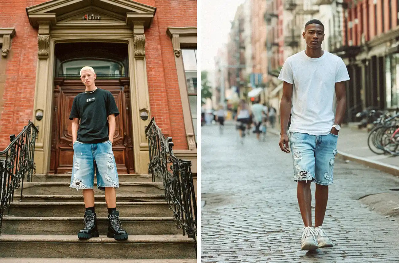 Left: A man with bleached hair stands on brick steps, wearing a black t-shirt and ripped y2k jorts with combat boots. Right: A man walks down a city street wearing a white t-shirt and distressed, light wash y2k jorts.