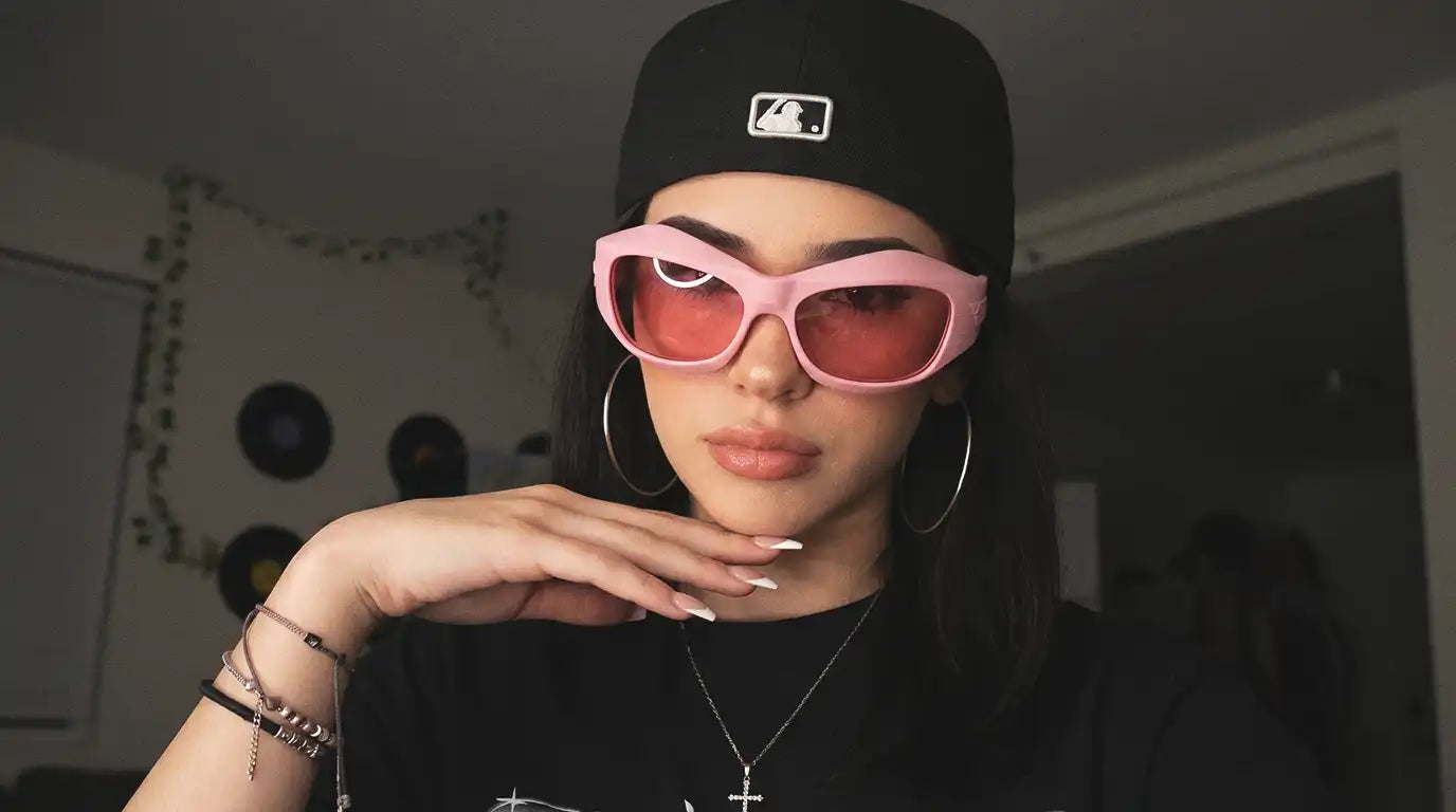 a girl with y2k sunglasses
